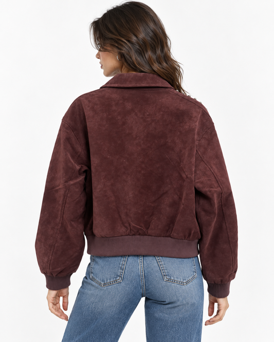 Bomber in ecopelle con ribattini