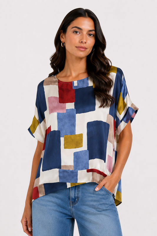 Blusa in satin a fantasia geometrica