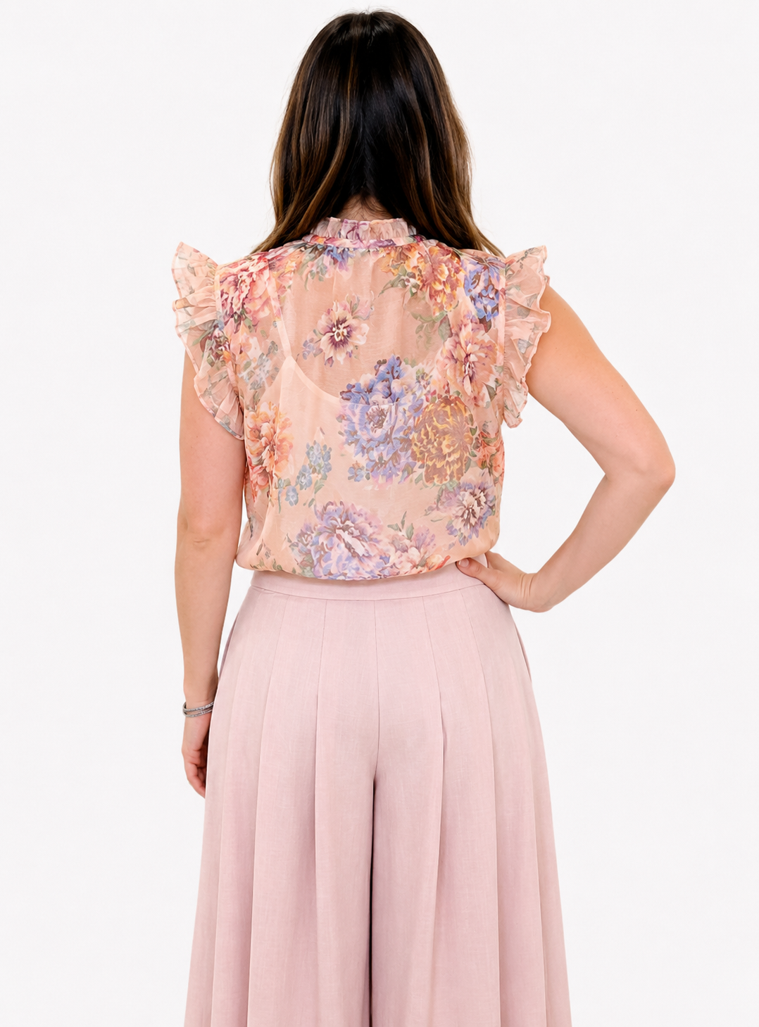 Blusa fiorata con volan